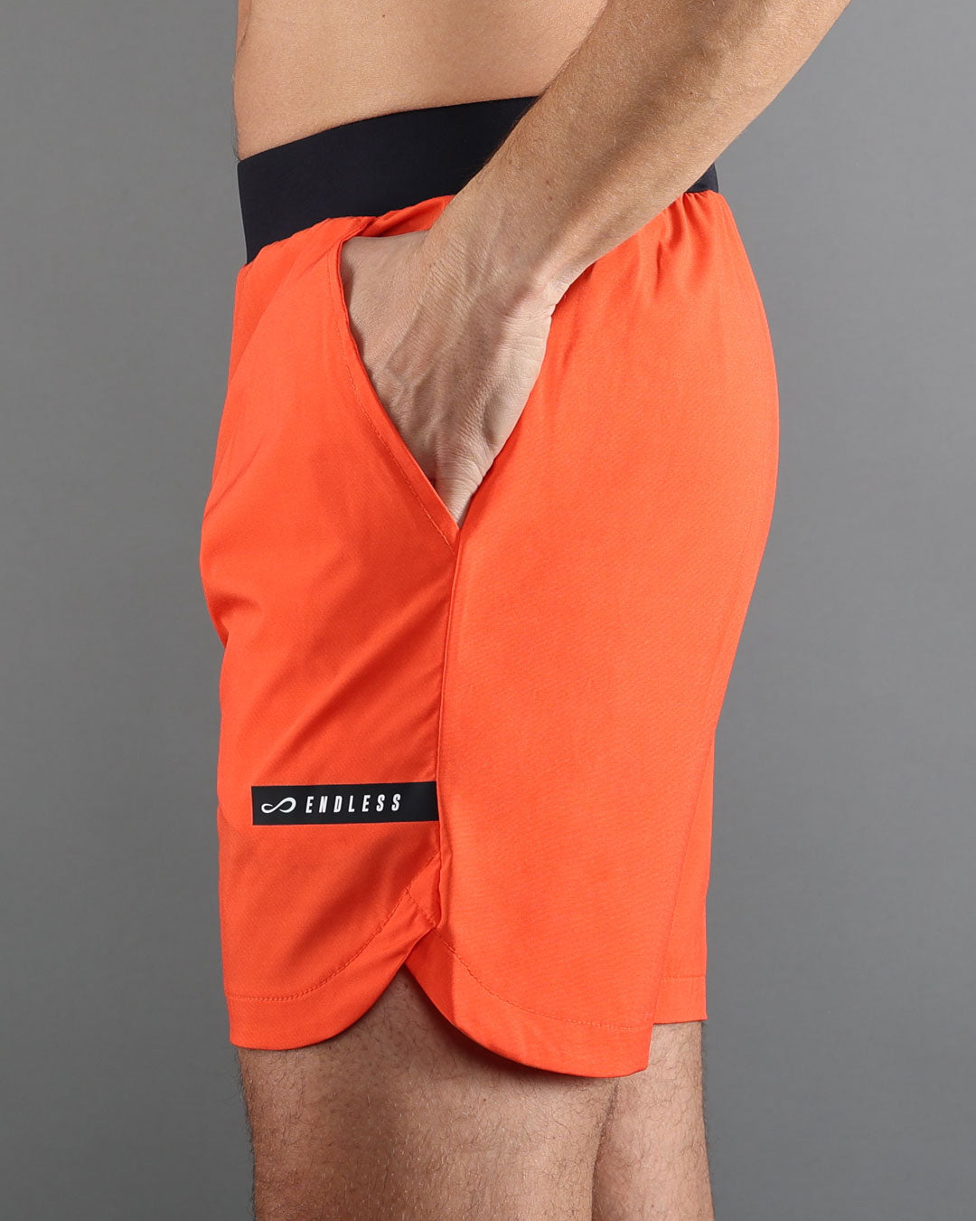 ENDLESS Short Swift Orange — vista lateral